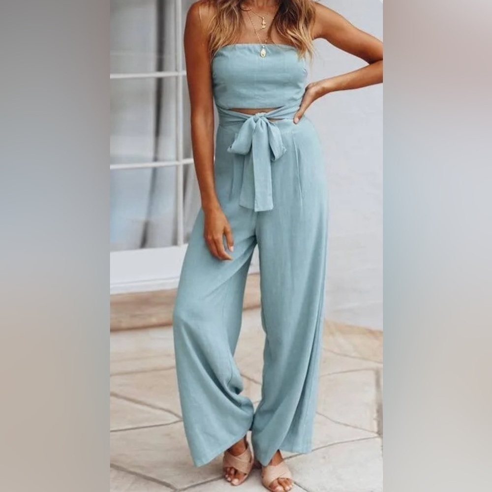BRAND NEW. Women’s Boho beach hut. Long blue front tie jumpsuit